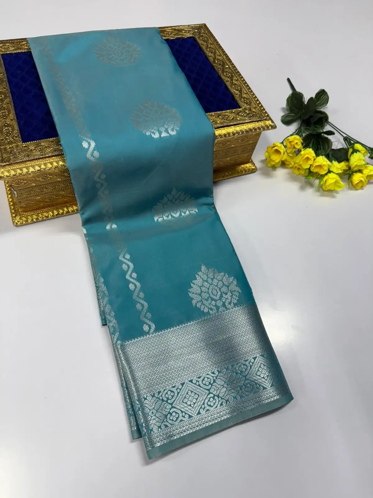 Large Floral Round Zari Butta Silver Brocade Border Semi Kanchipuram Silk Saree